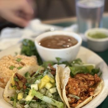 Guero's Taco Bar signature dishes Fish Taco PlateChico Taco Al PastorCarne Guisada Taco Plate